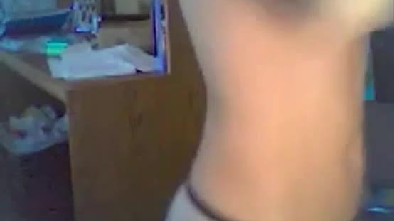 Cute brunette girl dances on webcam