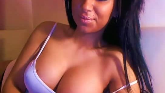 Hot brunette playing solo