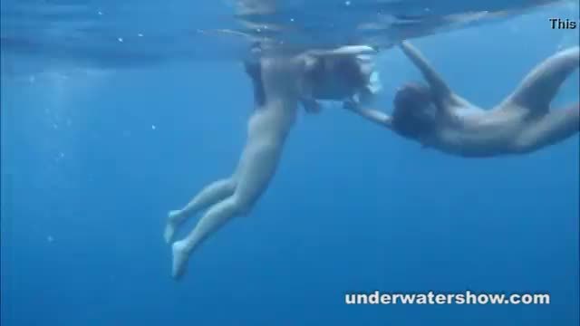Young lesbians getting nude in swimming pool