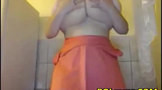 Flexible chubby redhead with big tits