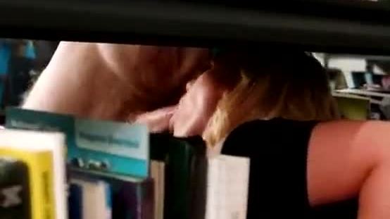 Blowjob in library