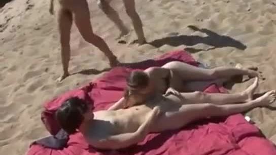 Shameless public orgy at nude beach