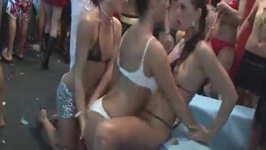 Two very hot brunette lesbian chicks has a lot of fun in a pool