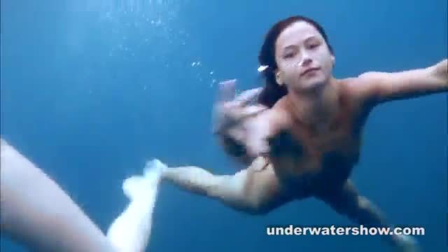 Young lesbians getting naked in swimming pool