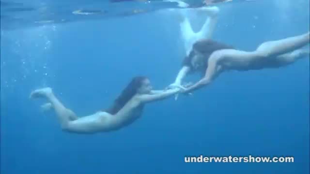 Young lezzies getting nude in swimming pool