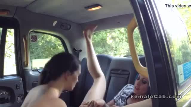 Brunette dyke eats female fake taxi driver