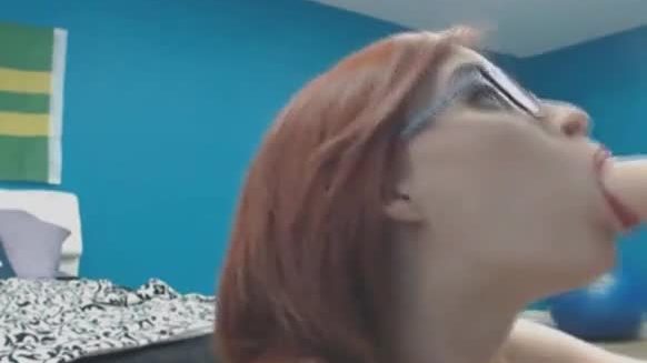 My pretty redhead neighbor sucks her dildo like a