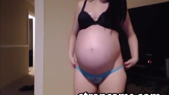 Pregnant brunette teen shows off